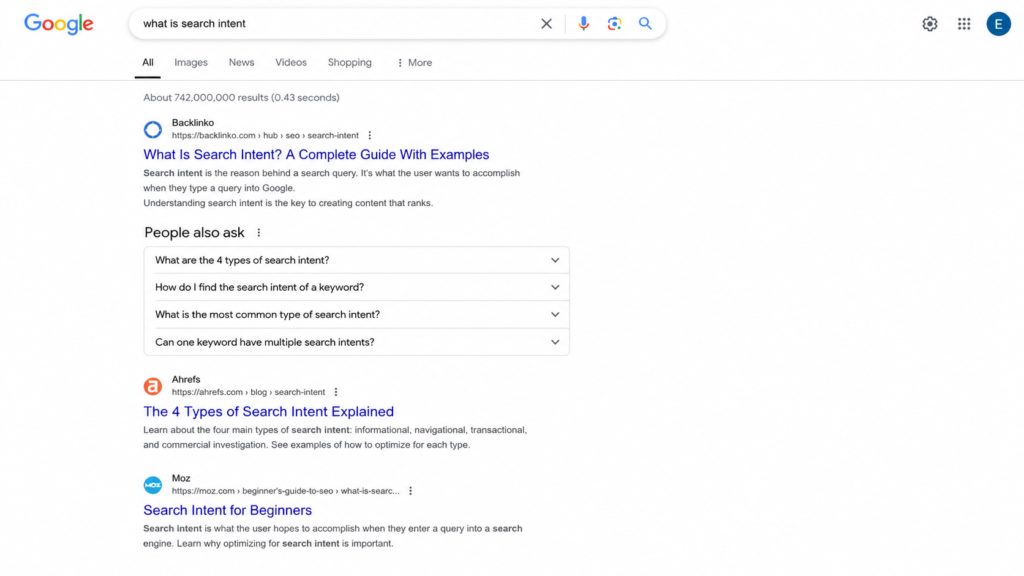 Google search results for “what is search intent” with a People Also Ask section.
